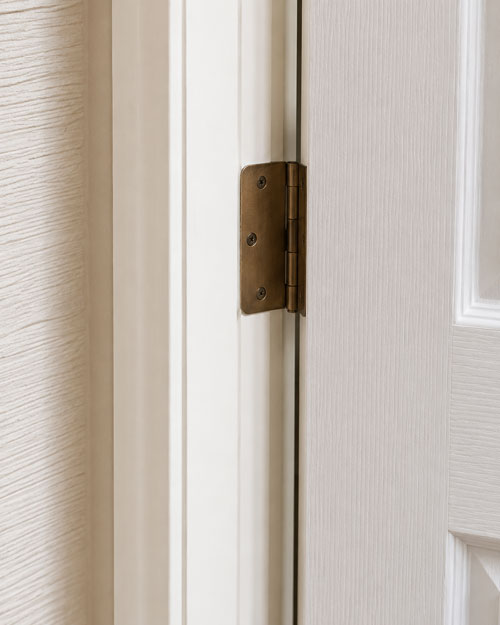 Adjusting a door hinge