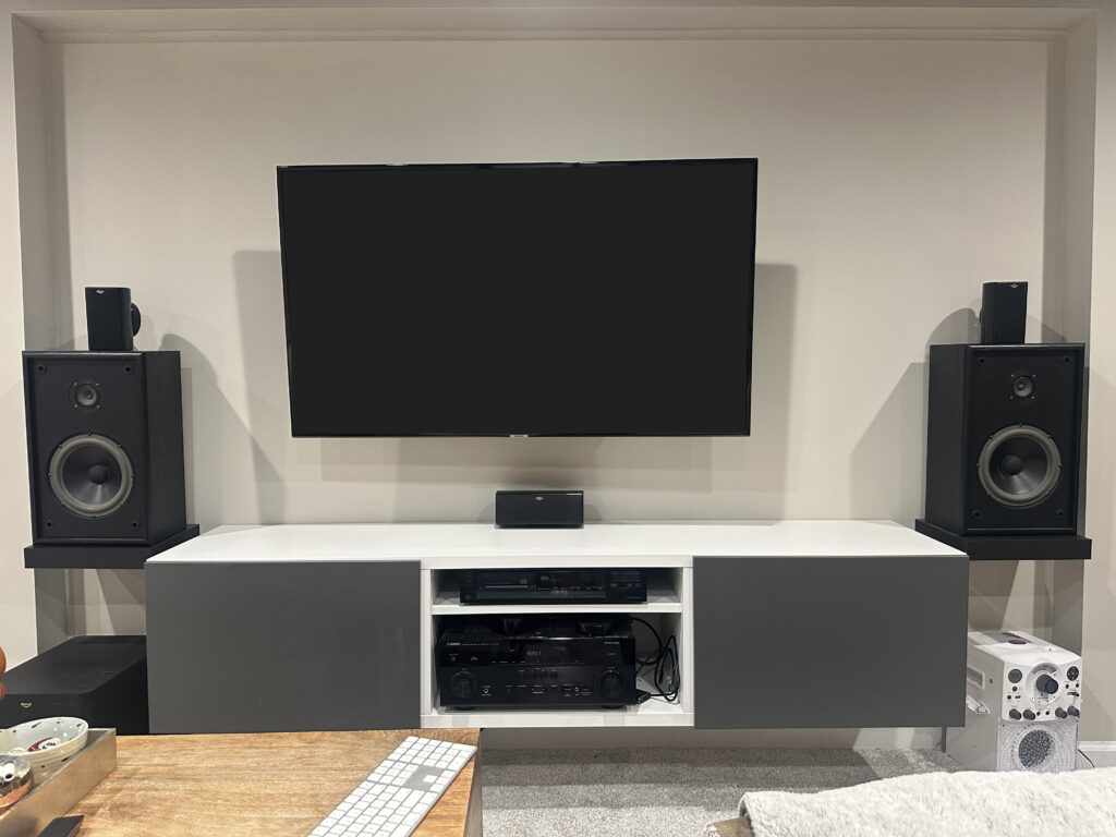A TV & Entertainment Center Mounted on a wall