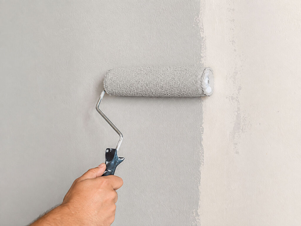 Rolling paint onto an interior wall